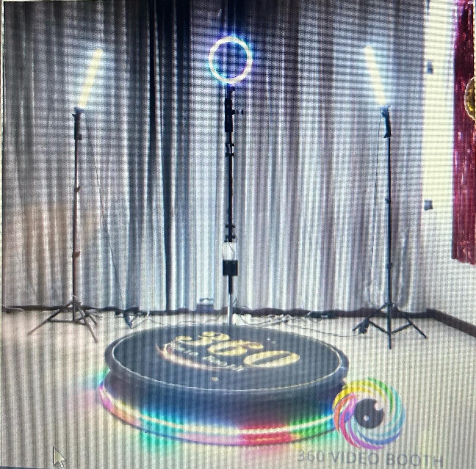 360 video booth with LED ring lights and curtain backdrop